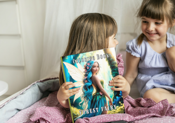 Forest Fairy Coloring Book Creative Play Two young girls smiling and looking at the Forest Fairy Coloring Book by Medeea Publishing.