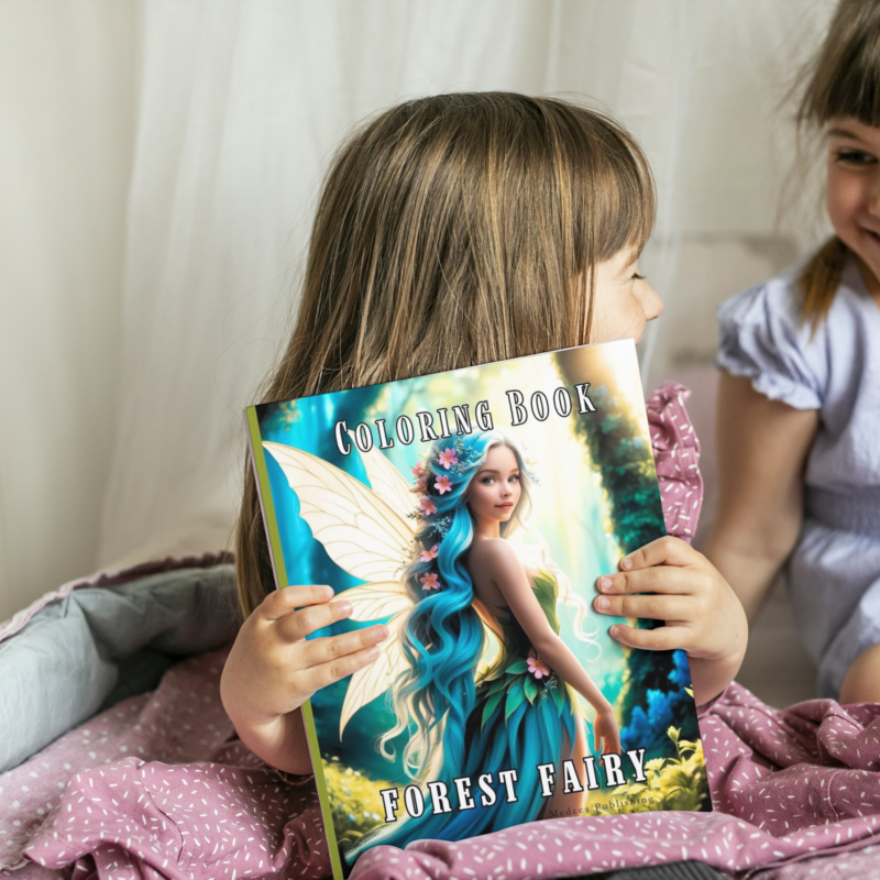 Two young girls smiling and looking at the Forest Fairy Coloring Book by Medeea Publishing.